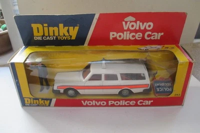 Dinky Toys No. Полицейский автомобиль 243 Volvo с аксессуарами в коробке не использовался  - Изображение 1 из 4