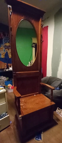 Antique Hall Tree w/ coat hooks, seating area, mirror, and storage compartment Cover