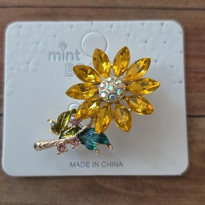 Broche de cristal girassol dourado com detalhes em pedras preciosas de flor de strass - Imagem 1 de 4