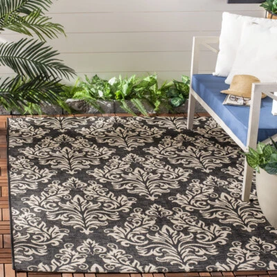 SAFAVIEH Indoor Outdoor CY6930-26 Courtyard Black / Creme Rug - Image 1 of 4