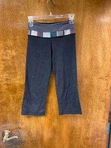 Lululemon with waist colored accents. Flare style  knee length leggings  Size wo - Picture 1 of 2