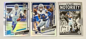 2023 Panini Optic Brandon Aubrey Holo + CeeDee Lamb Holo + 2025 Mosaic Notoriety - Picture 1 of 2