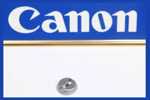210026 PROGRAMA CANON AE-1 PERILLA DE REBOBINADO SOLO PIEZA DE REPARACIÓN USADA SIN MANIVELA NI TORNILLO - Imagen 1 de 2