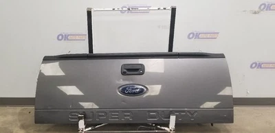 11 FORD F250 SD REAR TAILGATE ASSEMBLY WITH STEP AND REAR VIEW CAMERA GRAY - Image 1 of 4