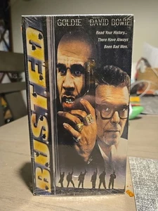 B.U.S.T.E.D. (VHS, 2000) Goldie David Bowie - Bild 1 von 3