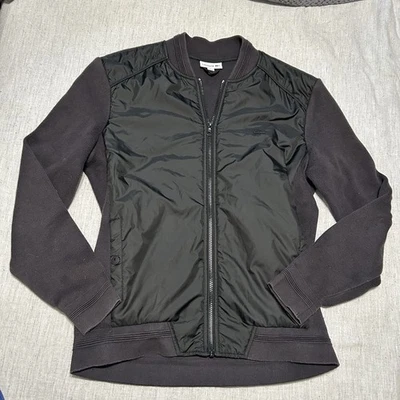 Chaqueta bomber negra para hombre Lacoste mediana cremallera completa manga tejida Foto 1 de 3