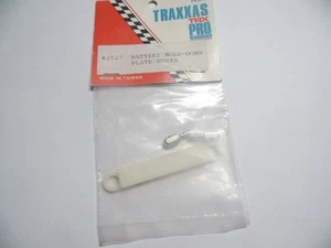 VINTAGE TRAXXAS 2527 Battery Hold Down Plate / Posts - Picture 1 of 1