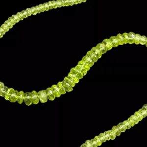 40ct Peridot - abgestufte facettierte Rondelle (2x1-6x2mm) 22cm Strang - Bild 1 von 3