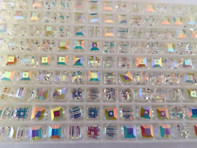 12 Swarovski Cube Beads 6mm Crystal AB. #5601 - Image 1 of 2