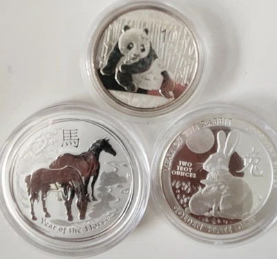 2015 Panda 1oz, 2014 Year of Horse 2oz, GSM Year Of Rabbit 2oz- Lot 5oz Silver - Image 1 of 2