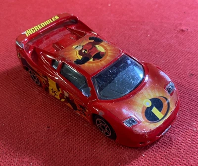 BBURAGO Modellino Auto MCA CENTENAIRE Metallo Rosso 1:43 THE INCREDIBLES Disney - Immagine 1 di 3