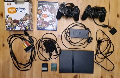 Playstation 2 Slim Schwarz mit 2 Controller, 12 Spielen und EyeToy Kamera - Bild 1 von 2