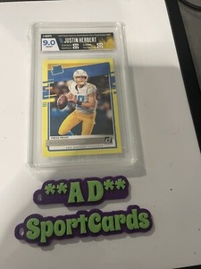 2020 Donruss Justin Herbert Rated Rookie Press Proof Yellow HGA 9