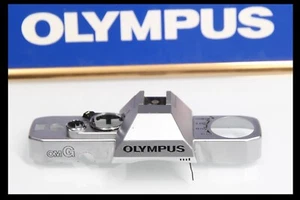 209663 OLYMPUS OMG CUBIERTA SUPERIOR PIEZA DE REPARACIÓN USADA OM-G - Imagen 1 de 3