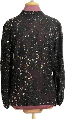 Blusa para mujer Club Monaco negra con motivo púrpura talla L venta al por menor $159 Foto 1 de 4