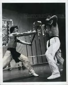 1977 Press Photo Acrobats Perform Knife Feat In Chinese Circus Revue - XXB09703 - Picture 1 of 2