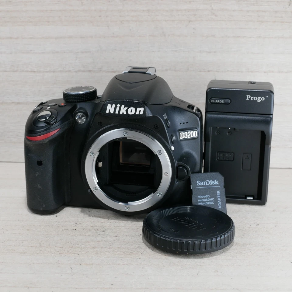 Cuerpo de cámara Nikon D3200 24,2 MP DSLR *BUENO/PROBADO* obturador 3.267 Foto 1 de 4