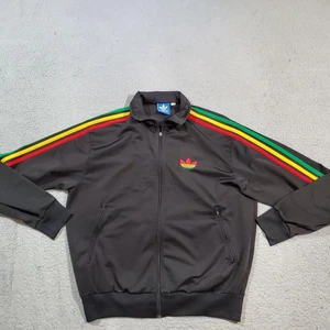 Adidas Giacca Uomo Grande Rasta Trifoglio Strisce Track Reggae 3 Strisce Zip Up - Foto 1 di 20