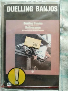 Duelling Banjos/Cassette Audio-K7 Sealed & Unopened - Zdjęcie 1 z 2