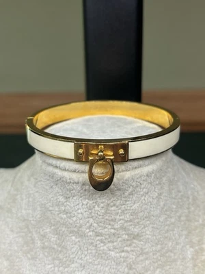 Brazalete Coach Signature Esmalte C Brazalete Bisagras Blanco y Dorado. 7"" Foto 1 de 4