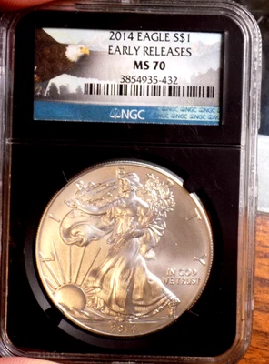 AMERICAN SILVER EAGLE 2014 1 TROY OZ NGC MS 70 EARLY RELEASE BLACK HOLDER - Image 1 of 3