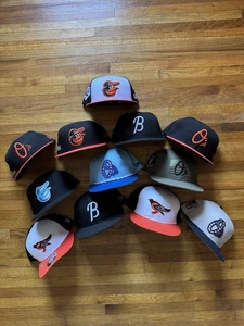 LOT Of 12 Baltimore Orioles Player Issued/Game Worn New Era Hats 7 3/8 - Picture 1 of 6