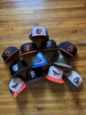 LOT Of 12 Baltimore Orioles Player Issued/Game Worn New Era Hats 7 3/8 - Image 1 of 4