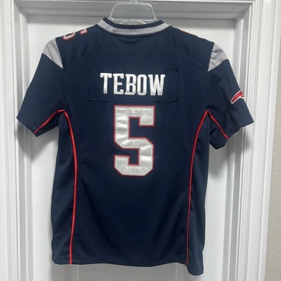 Camiseta Tim Tebow New England Patriots Nike On Field Juvenil MEDIANA Cosida Foto 1 de 4