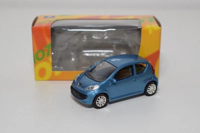 B86 1:64 3 INCH 3 POLLICI NOREV PEUGEOT 107 3 PORTE PORTE MET. BLUE MIB - Immagine 1 di 4