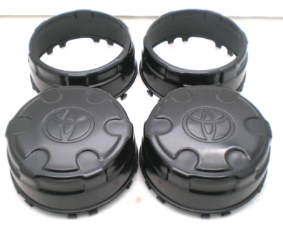 JUEGO tapas centrales negras brillantes Toyota Tacoma 4Runner FJ Cruiser OEM P/N 42603-35610 Foto 1 de 4