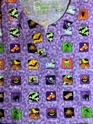 TOP EXFOLIANTE TALLA XXS HALLOWEEN APLICACIONES ESPELUZNANTES NUEVO CON ETIQUETAS ENFERMERA MÉDICO DENTAL VETERINARIO CNA Foto 1 de 4