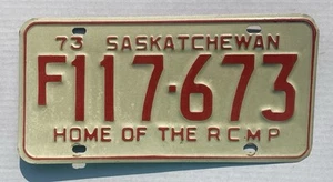 Single 1973 SASKATCHEWAN Canada License Plate #F117-673 HOME OF THE RCMP - Picture 1 of 2