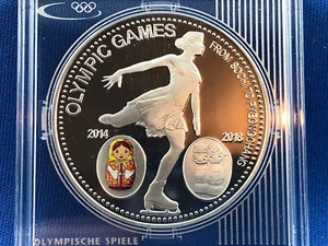 LAOS SILVER PROOF 1000 KIP COIN 2014 YEAR OLYMPIC GAMES SOCHI TO PYEONGCHANG - Picture 1 of 4