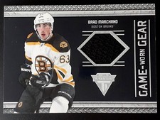 BRAD MARCHAND JERSEY 2011-12 PANINI TITANIUM GAME WORN GEAR 11-12 NO 86   0009