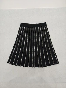 SIONI. Falda negra con diseño blanco, talla S - Imagen 1 de 4