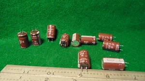 (10) Condensadores electrolíticos de plomo formado radial KMX 10uF 450 WV NUEVO DE LOTE ANTIGUO - Imagen 1 de 1
