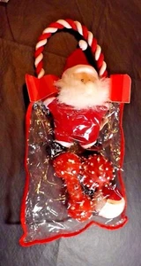 BOLSA DE PLÁSTICO NAVIDAD PERRO CON CUATRO JUGUETES DE PELUCHE Y GOMA CANINOS NUEVA CON ETIQUETAS - Imagen 1 de 6