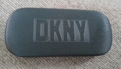 DKNY GRANDE NEGRO ACANALADO OJO CRISTAL ESTUCHE RÍGIDO USADO EN EXCELENTE ESTADO Foto 1 de 3
