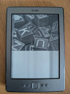 Amazon Kindle 4th Generation - Graphite - Model D01100 2GB eReader - Picture 1 of 2