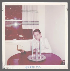 Found Photo 1972 Man Reading Book Bible In Front of Window Candles 3.5 x 3.5 - Picture 1 of 2