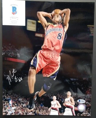 Foto firmada por Monta Ellis de los Golden State Warriors 11x14. BECKETT  Foto 1 de 4