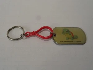 VINTAGE - NINETENDO KEYRING - w/TURTLE ABOUT 2 X 1 1/4 INCHES PLUS RINGS - Picture 1 of 4