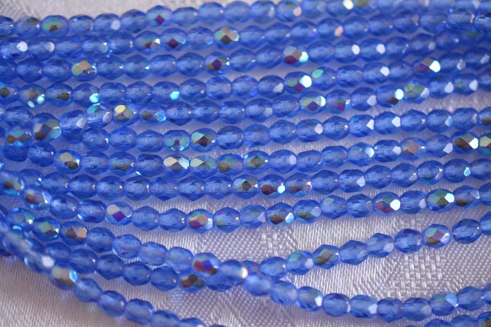Czech Fire Polished 4mm round faceted glass beads - Sapphire AB - Image 1 of 1