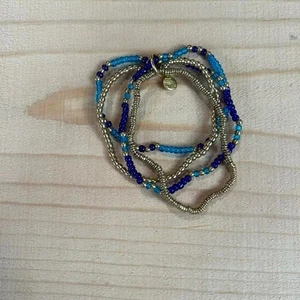 Pulsera elástica estilo bohemio azul y dorado para mujer #festivalvibes - Imagen 1 de 1