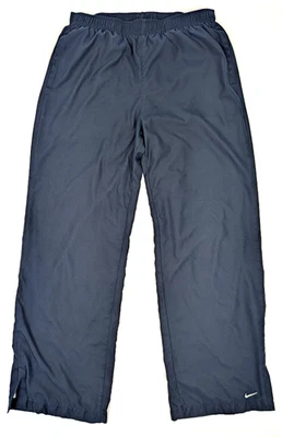 Pantalones de chándal forrados NIKE de colección para mujer M (8-10) (28x29) elásticos azul marino puño ancho Foto 1 de 4