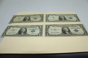 Four - One dollar Silver Certificates mix lot - Blue Seal 1935-1937-1957 - Picture 1 of 10