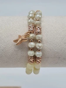 Biba Armband elastisch Set von 2, Hellgrün mit Goldfarben und Seestern Anhänger - Bild 1 von 2