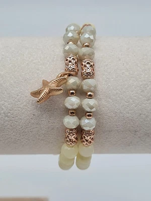 Biba Armband elastisch Set von 2, Hellgrün mit Goldfarben und Seestern Anhänger - Bild 1 von 2