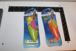 Vintage Pez Candy Dispenser Rocket Pen Lot of 2 Orange and Green New Old Stock - Picture 1 of 8