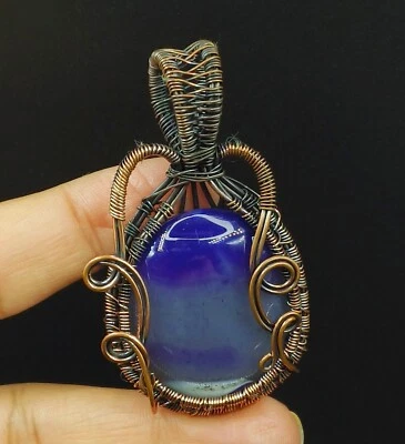 Colgante de joyería hecha a mano envuelto en alambre de cobre con piedras preciosas de ónix púrpura cobre Foto 1 de 4